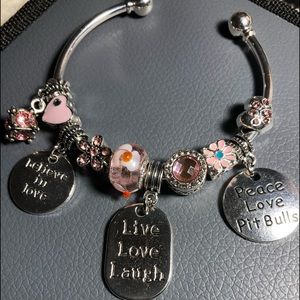 Pink pit bull charm bracelet.